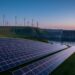 Wind turbines, solar panels, and a hydroelectric dam in a Canadian landscape at dusk, symbolizing a shift to a renewable electricity future.