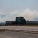 Vernon Science Centre in the BC Interior with light wildfire smoke drifting across the Okanagan Valley under overcast light, suggesting changing air quality conditions influenced by wind.