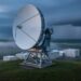 Weather radar dish near Montreal scanning storm clouds, illustrating how precipitation and wind patterns are tracked.